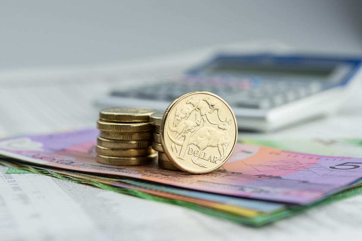 Paper bills and coins on the table