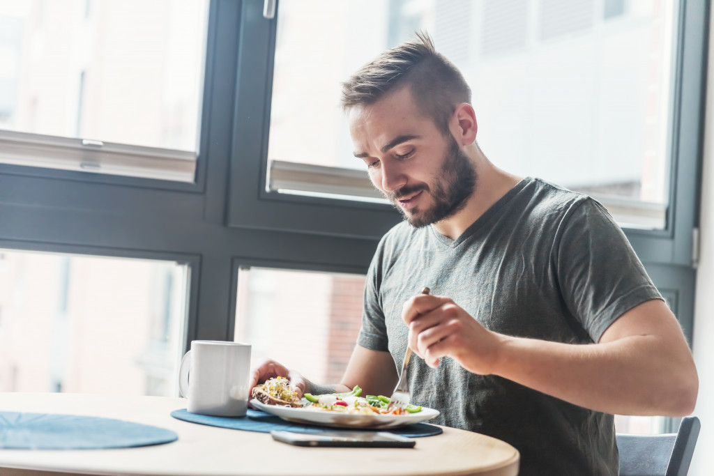 man eating