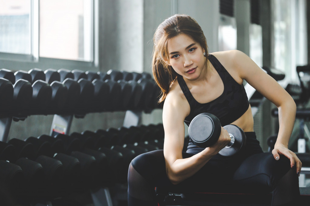 a woman lifting weights