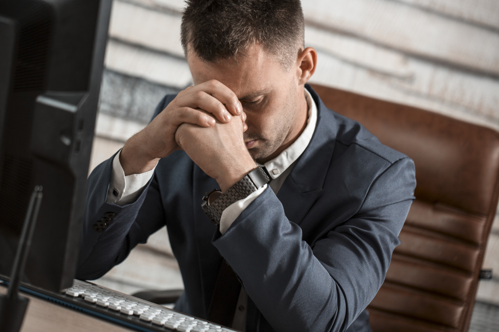 An exhausted worker at work