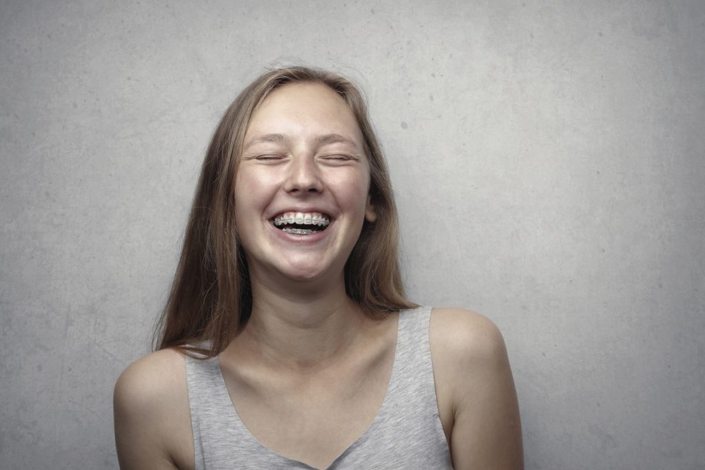 woman smiling with braces