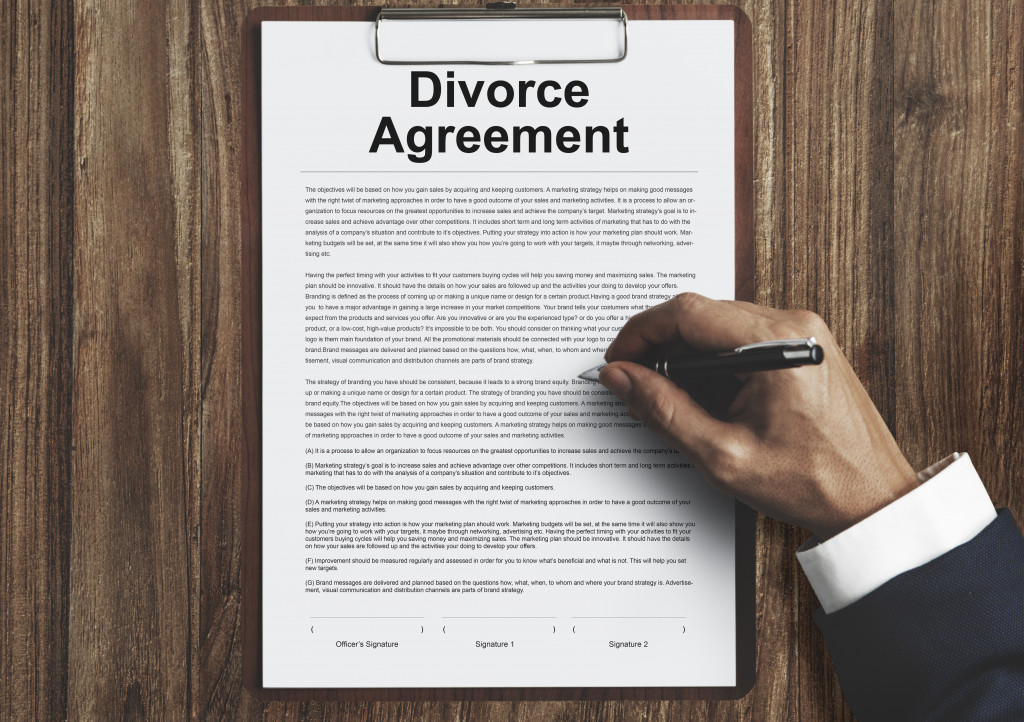 divorce agreement document about to be signed by lawyer
