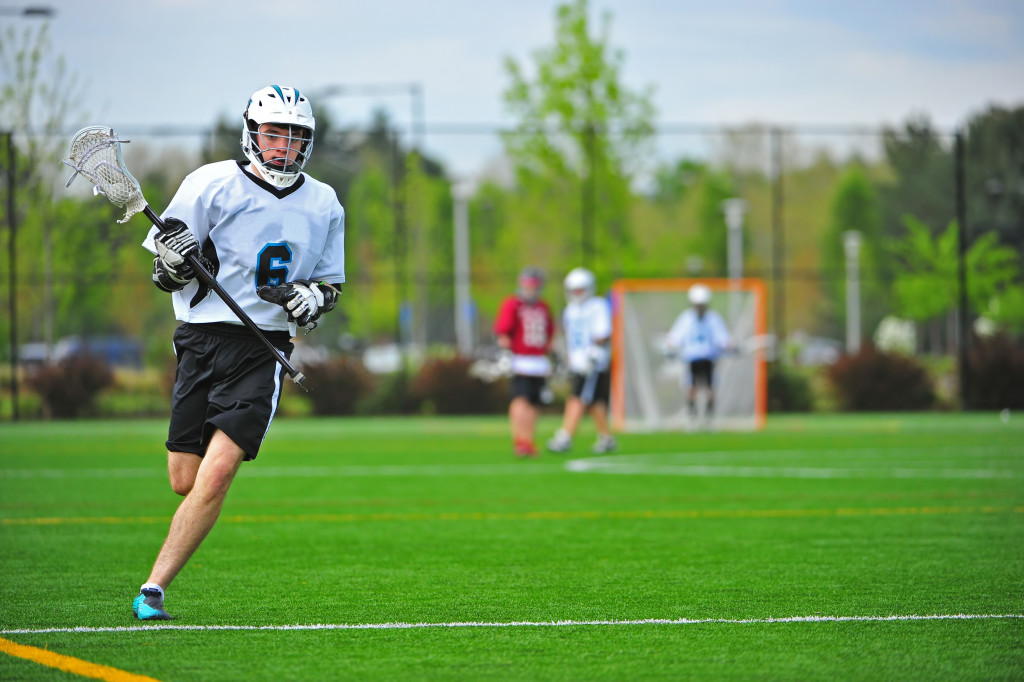 man playing sports on the field