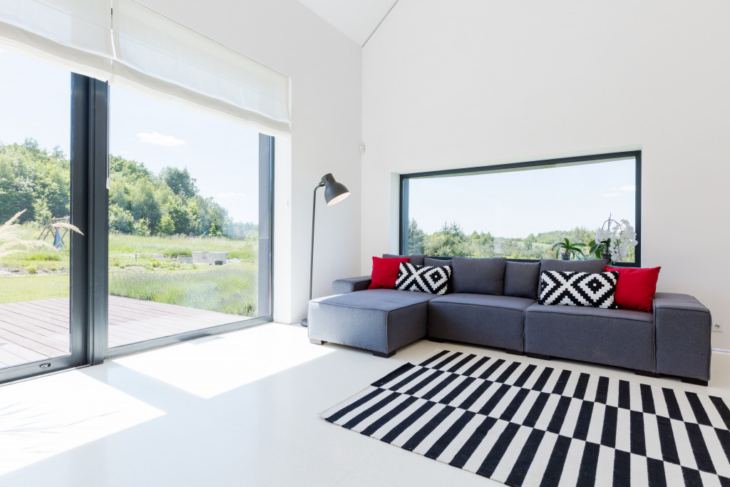 bright living room with open windows